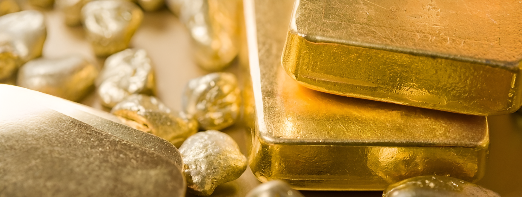 Illustrative gold bars and precious metal pieces before jewellery making