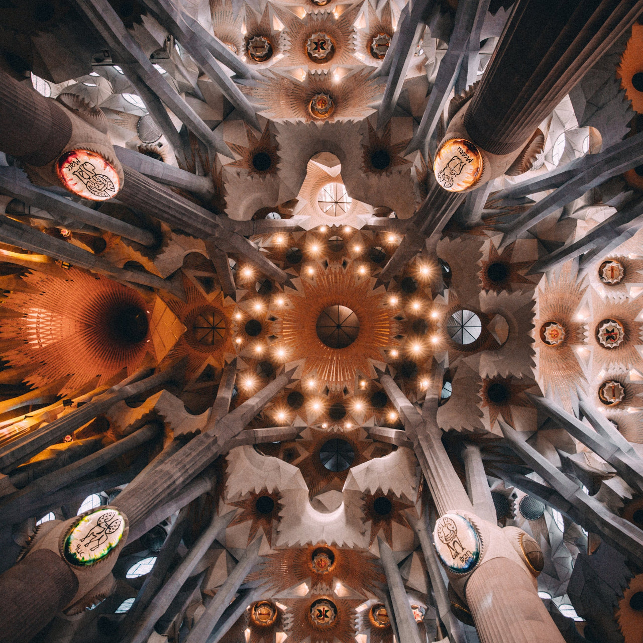 Ceiling of a famous architectural landmark with intricate designs and lighting.