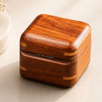 Wooden jewelry box on a light surface